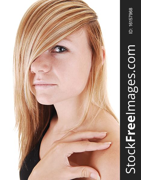 A closeup face shoot of a young blond woman, one eye covert from
her hair, looking into the camera on white background. A closeup face shoot of a young blond woman, one eye covert from
her hair, looking into the camera on white background.