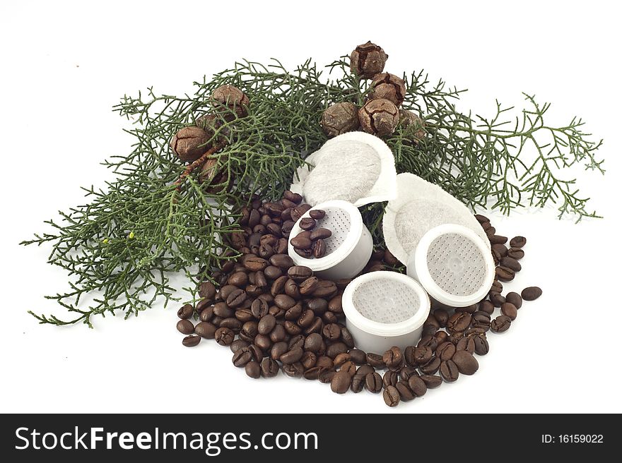 Coffee pods and coffee beans on white background. Coffee pods and coffee beans on white background