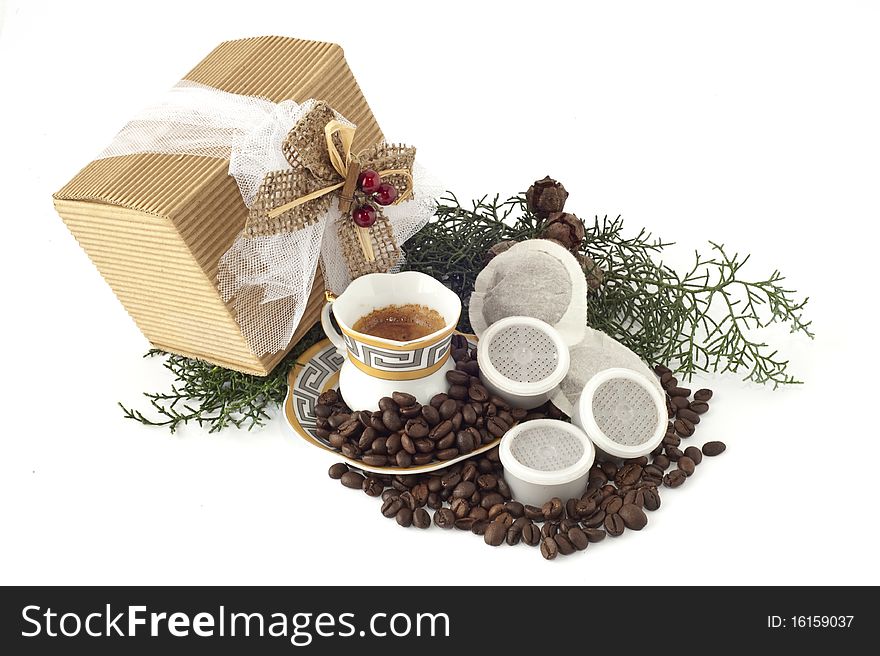 Cup of espresso coffee pods and coffee beans on white background. Cup of espresso coffee pods and coffee beans on white background