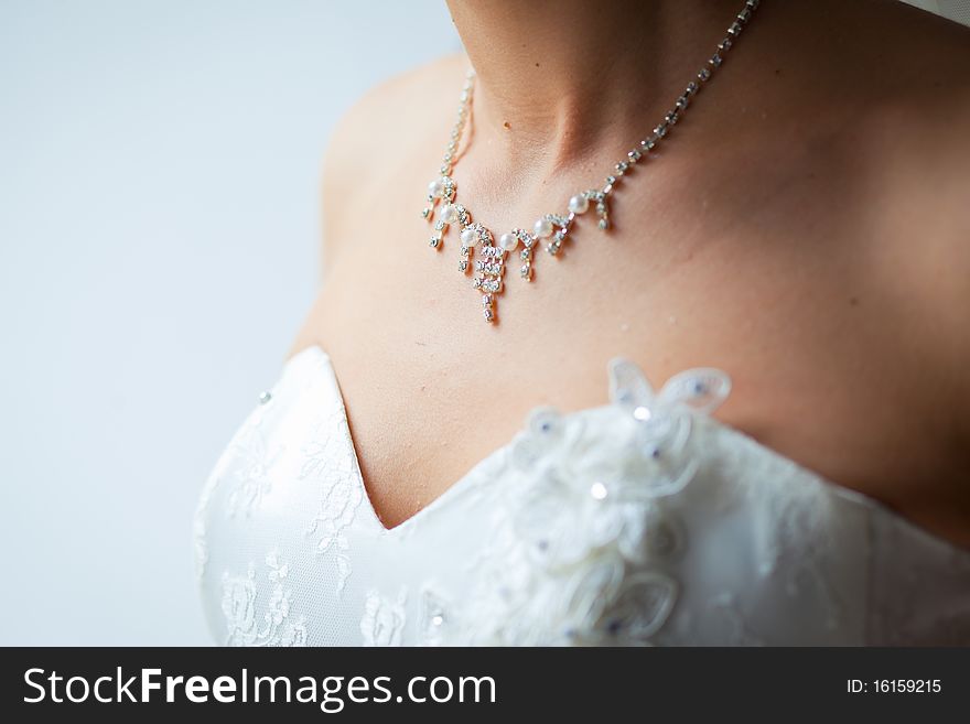 Beautiful adornment on neck of young bride