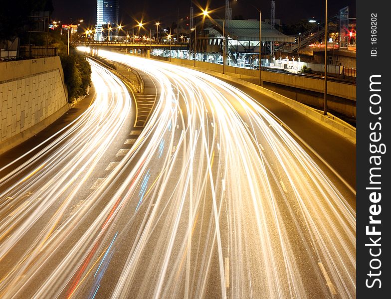 A long exposure image of a highway traffic. A long exposure image of a highway traffic