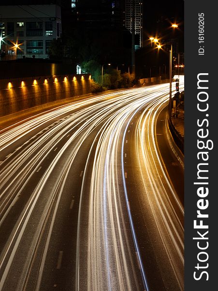 A long exposure image of a highway traffic. A long exposure image of a highway traffic