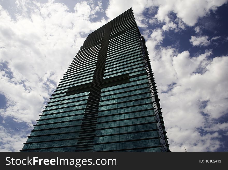 Skyscraper in the sky with clouds. Skyscraper in the sky with clouds