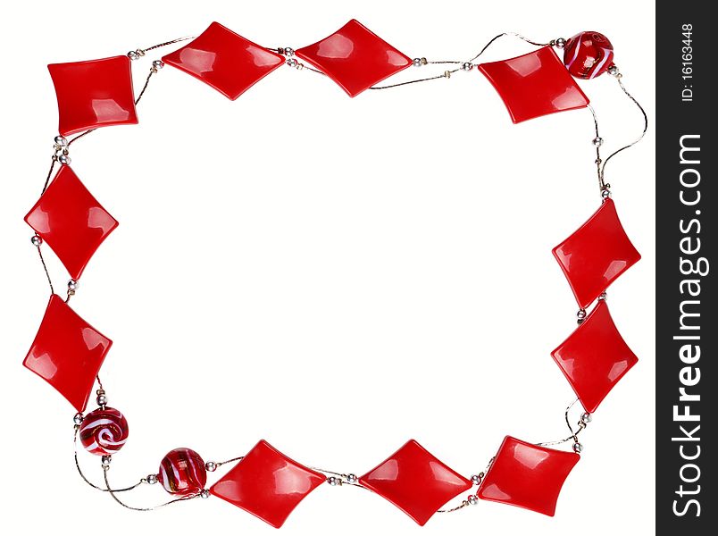 Frame of red necklace isolated on white background. Frame of red necklace isolated on white background