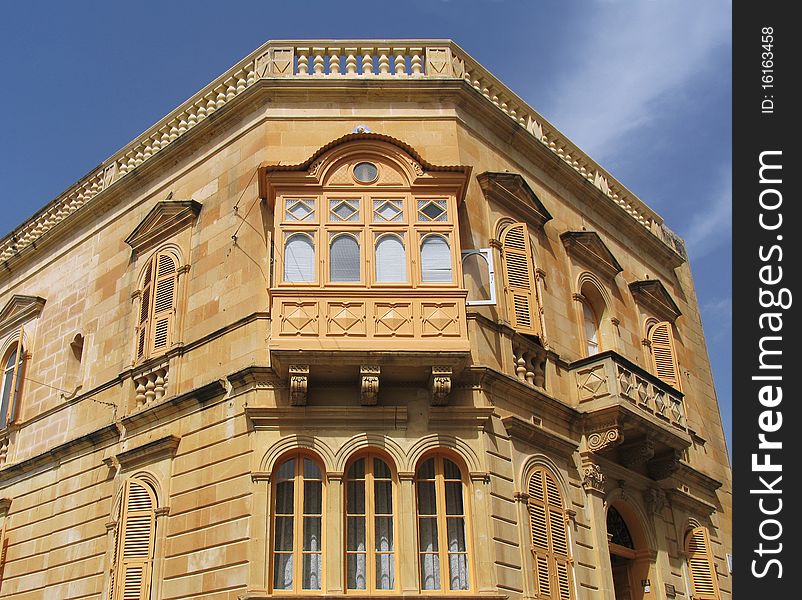 Typical maltese house with balcony