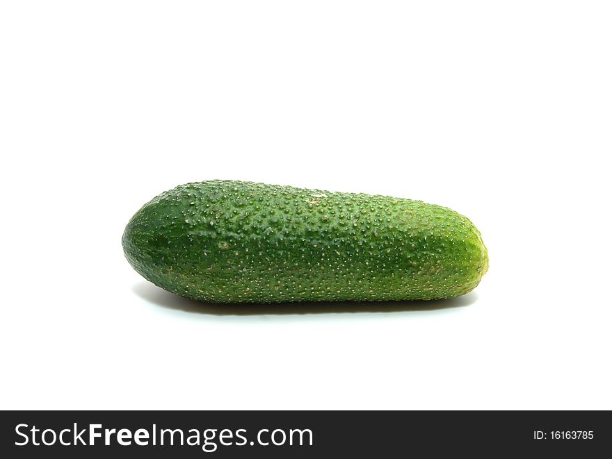 Single whole cucumber on white background. Single whole cucumber on white background.