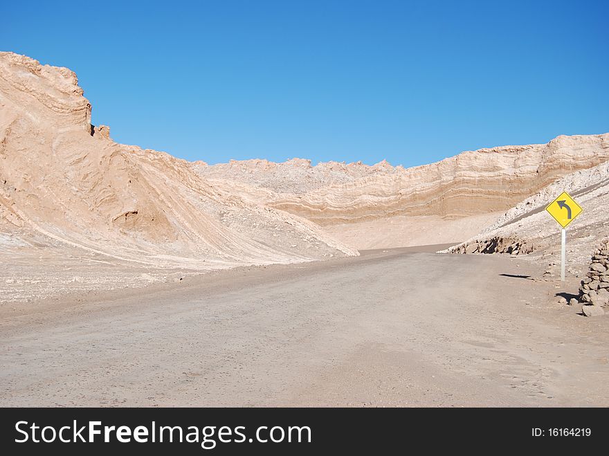 Valle de la Luna road and sign, Atacama Desert, Chile). Valle de la Luna road and sign, Atacama Desert, Chile)