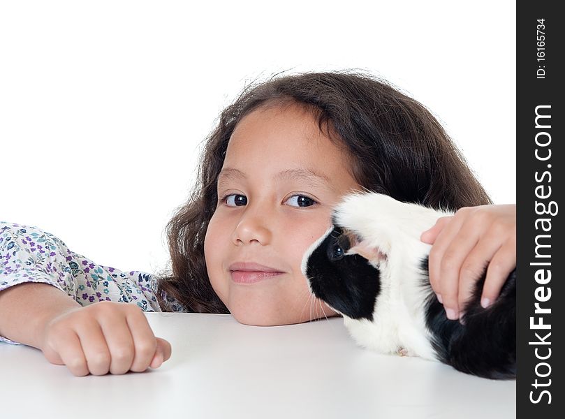 Pretty girl with guinea pig, child hold domestic animal before white background