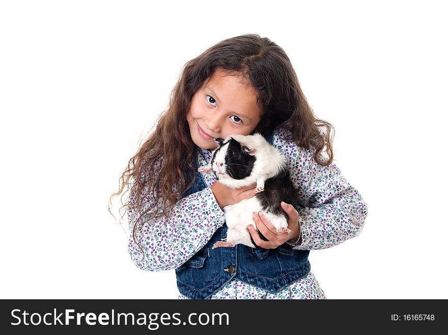 Pretty girl with guinea pig, child hold domestic animal before white background