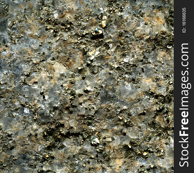Texture of pyrite crystal inclusion in quartz, like gold. Texture of pyrite crystal inclusion in quartz, like gold