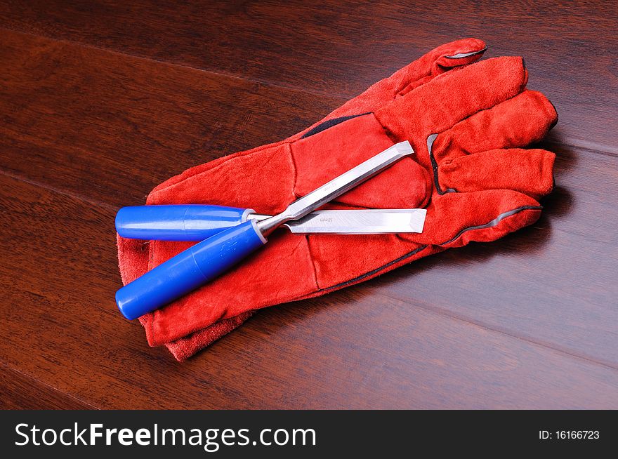 Gloves for working in red and blue tools