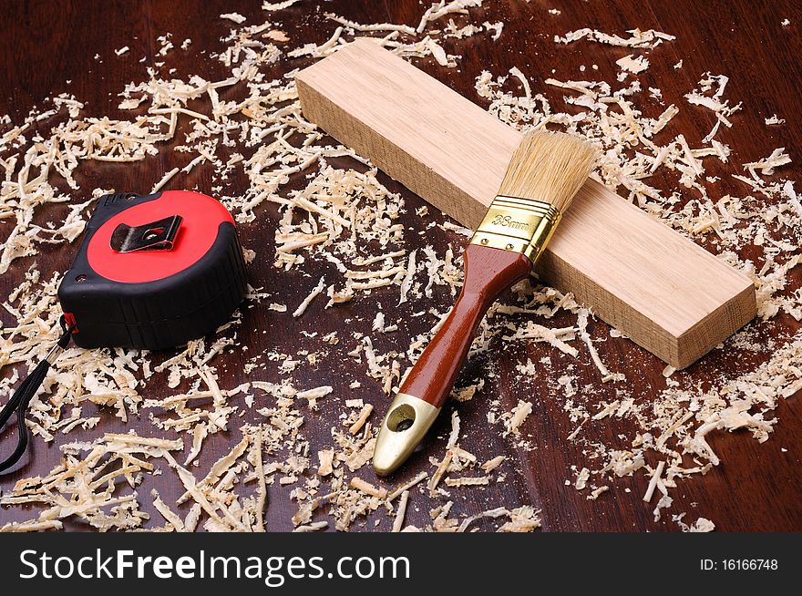 Shavings of wood, brick and roulette for measuring