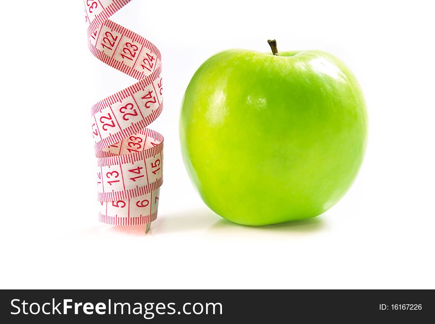 Green Apple isolated on white with measuring tape. Great diet concept.