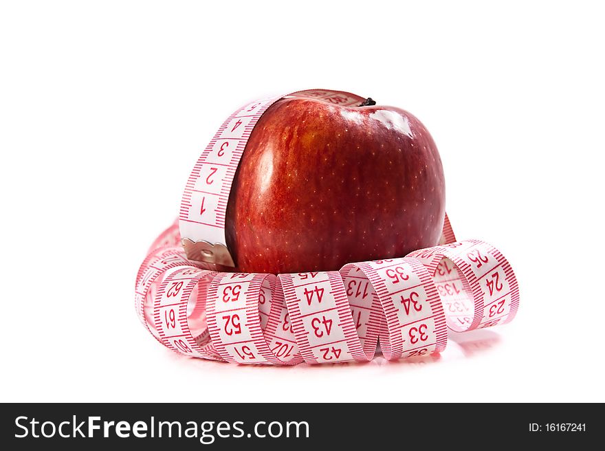 Red Apple isolated on white with measuring tape. Great diet concept.