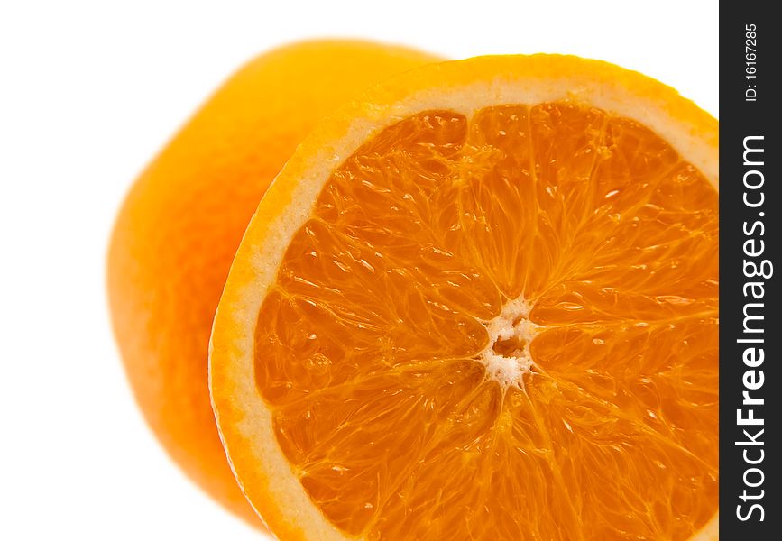 One Half Of Orange With Another Whole Orange