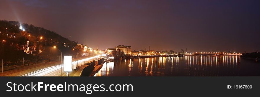 Landscape of nightly city. Stitched Panorama