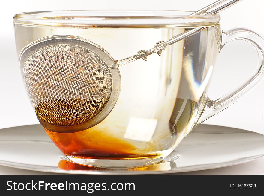 Antioxidant rich healthy herbal rooibos tea from the Western Cape region in South Africa, brewing in a cup. Antioxidant rich healthy herbal rooibos tea from the Western Cape region in South Africa, brewing in a cup.