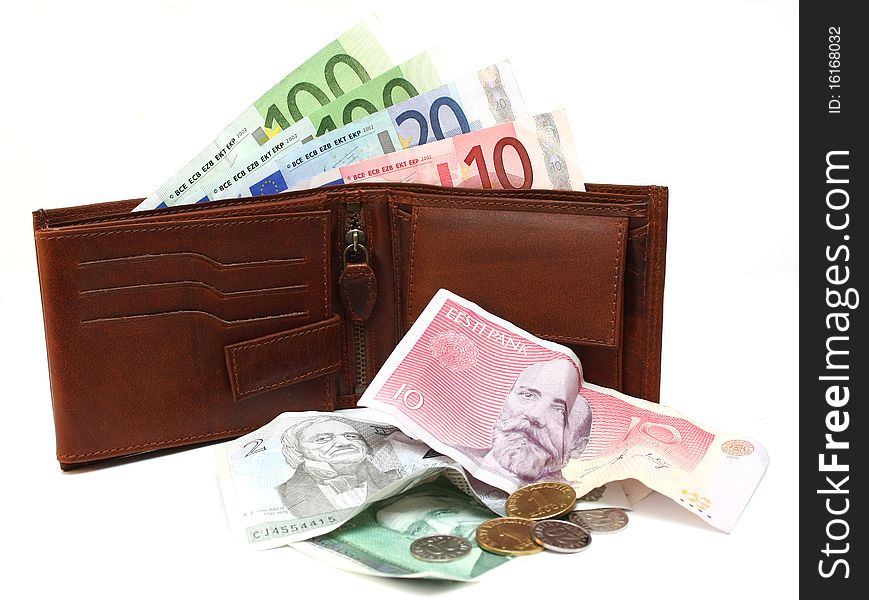 Old crumpled Estonian money and new euro money in the wallet. Old crumpled Estonian money and new euro money in the wallet