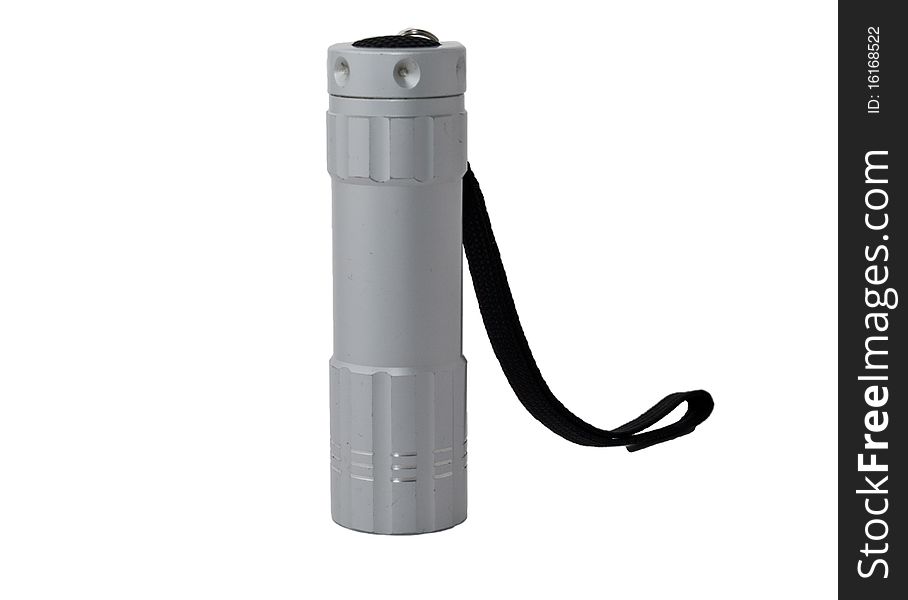 Aluminum flashlight with a black strap on a white background