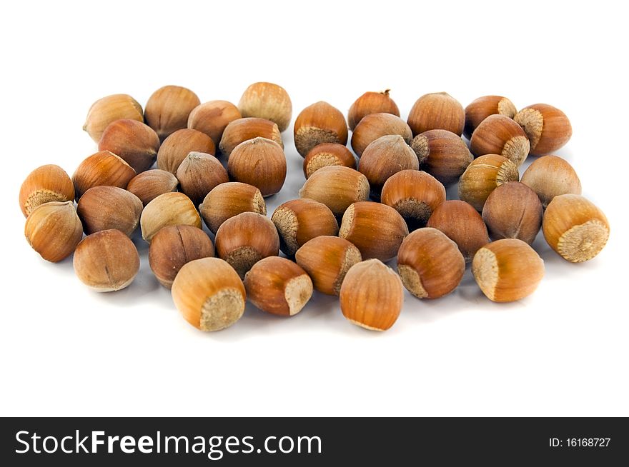 Heap of hazelnut on white background