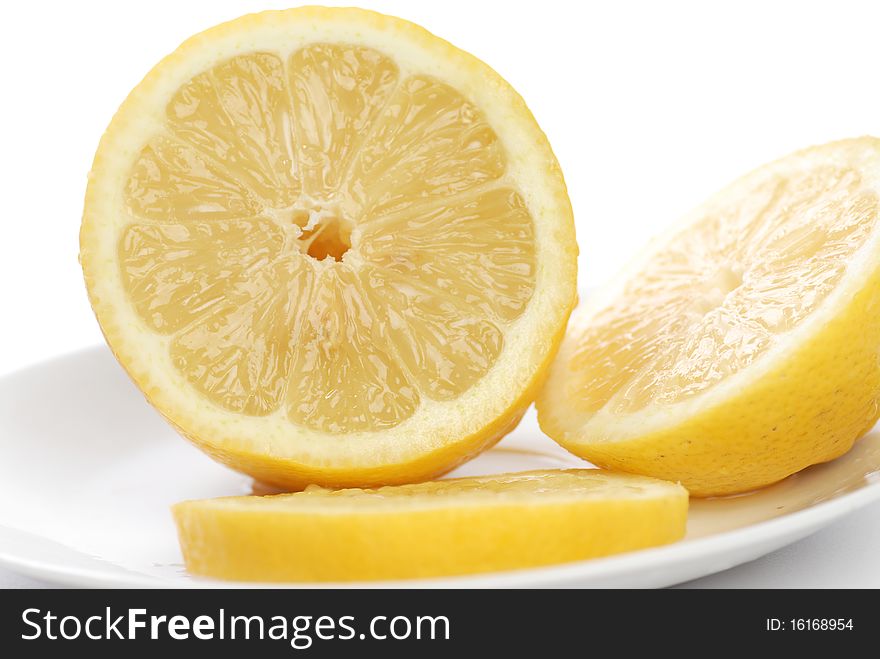 Yellow lemon isolated on white