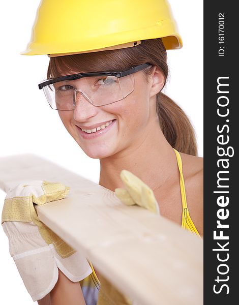 Happy female worker with wood on white background