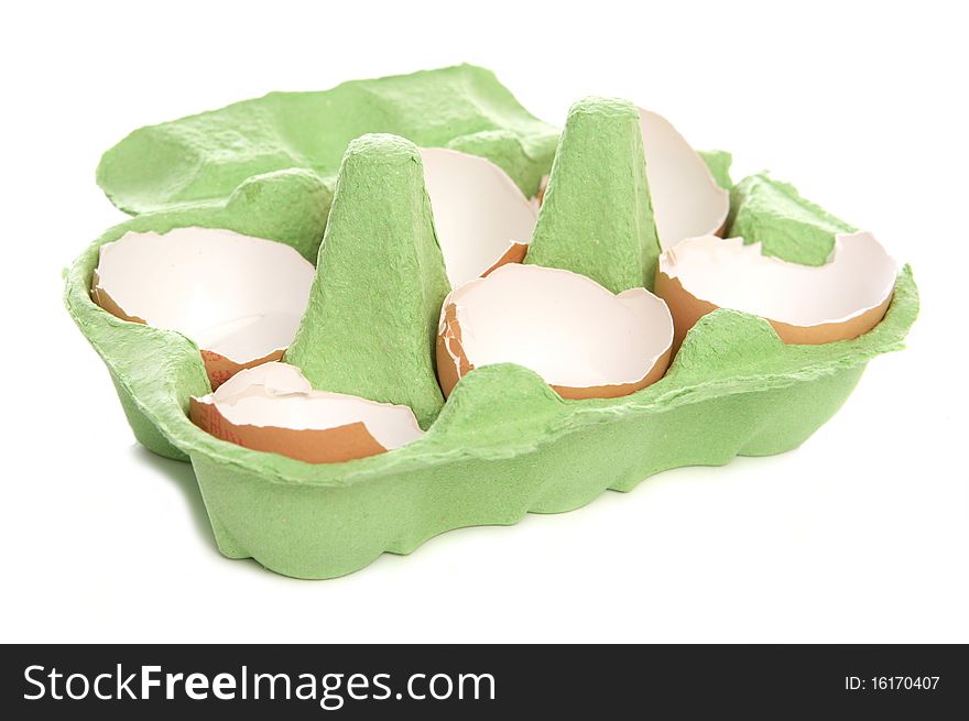 Broken egg shells in eggbox studio cutout. Broken egg shells in eggbox studio cutout