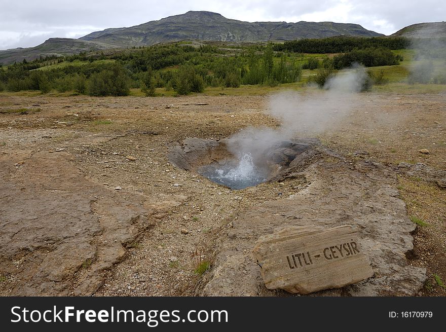 The small geyser on Icelandic - Litli Geysir. The small geyser on Icelandic - Litli Geysir.