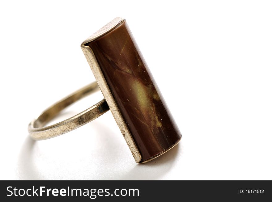 Antique silver finger-ring with jasper over white background