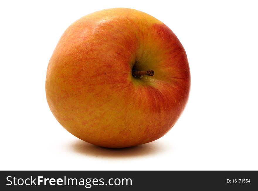 Red-and-yellow apple isolated over white background