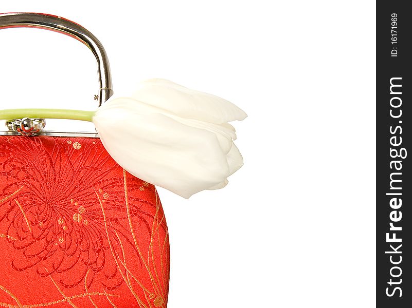 Red Purse With White Tulip Isolated On White