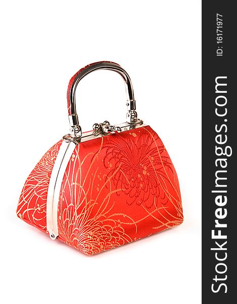 Fashionable red purse with texture isolated on white. Fashionable red purse with texture isolated on white