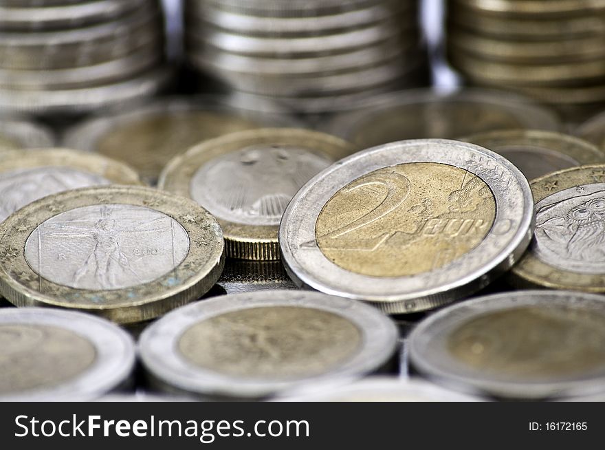 Assorted grungy euro coins close up. Assorted grungy euro coins close up