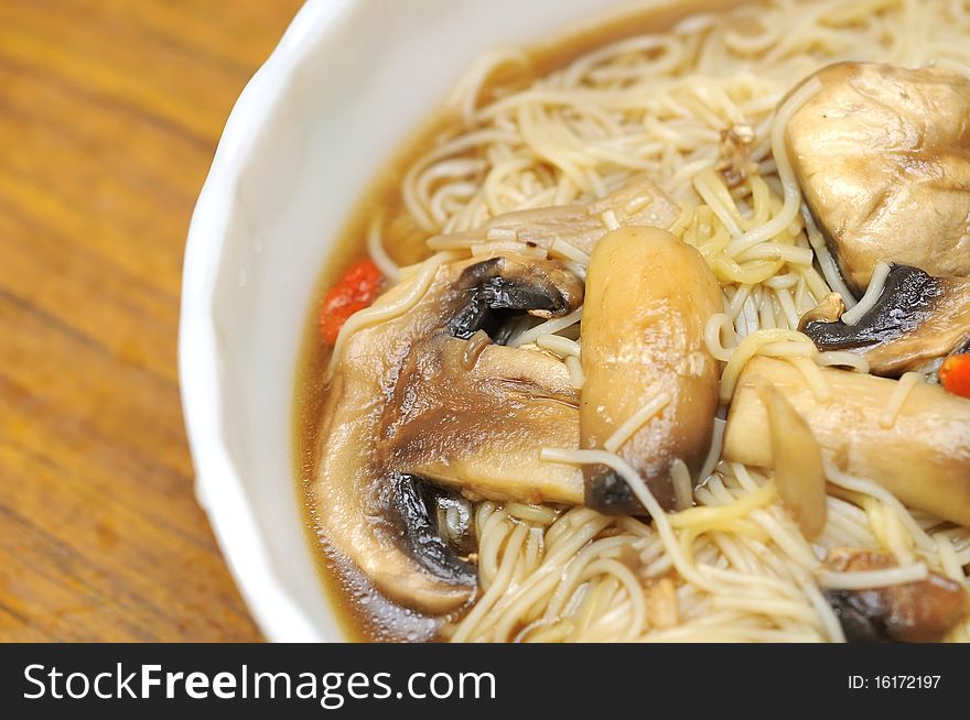 Sumptuous looking Chinese style vegetarian noodles. Made with mushrooms and herbal medicine. For concepts such as healthy lifestyle, and food and beverage. Sumptuous looking Chinese style vegetarian noodles. Made with mushrooms and herbal medicine. For concepts such as healthy lifestyle, and food and beverage.