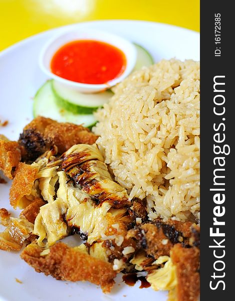 Singapore style chicken rice delicacy. Suitable for concepts such as creative food, and food and beverage. Singapore style chicken rice delicacy. Suitable for concepts such as creative food, and food and beverage.