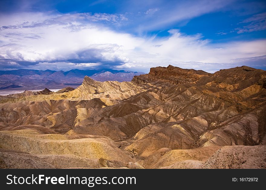 A scenic view of eroded rock formation in desolated Death Valley. USA, California. A scenic view of eroded rock formation in desolated Death Valley. USA, California