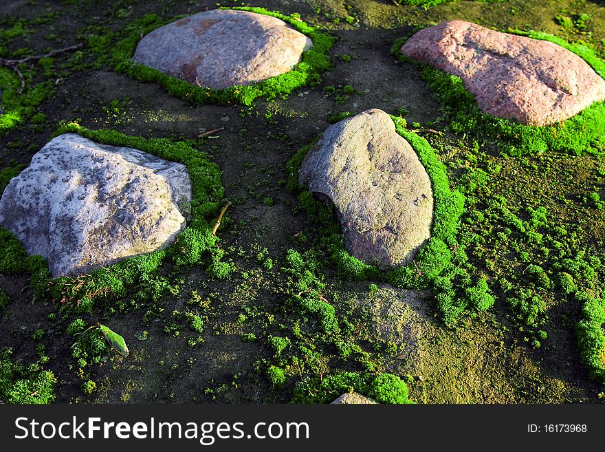 Old structure from stones which are covered by a moss. Old structure from stones which are covered by a moss