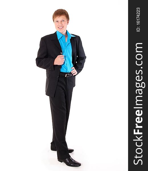 Young handsome student dressed in black suit, full-length. Young handsome student dressed in black suit, full-length