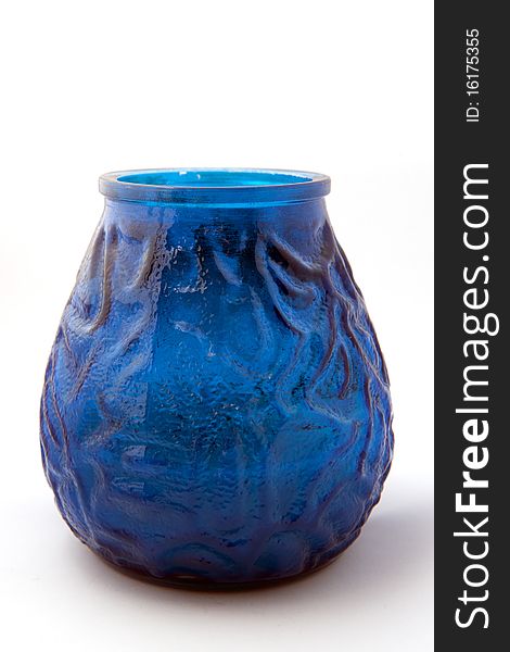An blue textured holder for at candlelight. An blue textured holder for at candlelight