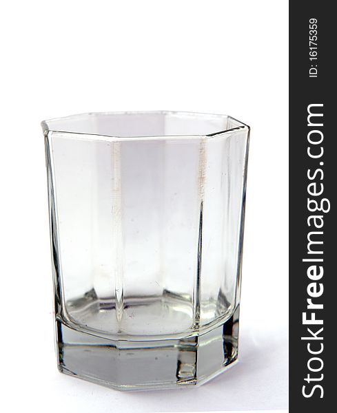 An empty octagon glass on a white background. An empty octagon glass on a white background