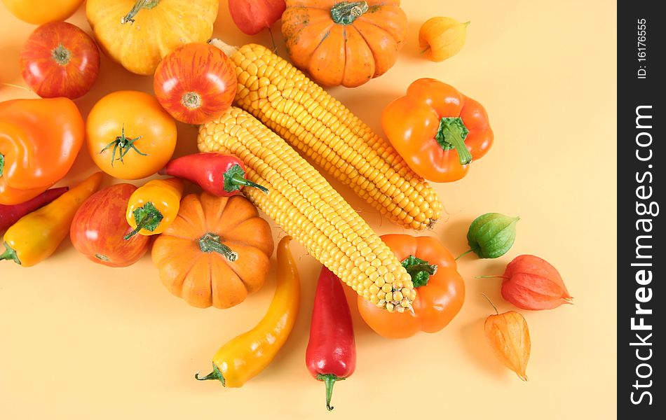 Fresh healthy vegetables on yellow background. Fresh healthy vegetables on yellow background