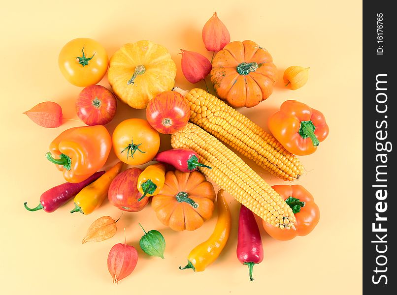Fresh healthy vegetables on yellow background