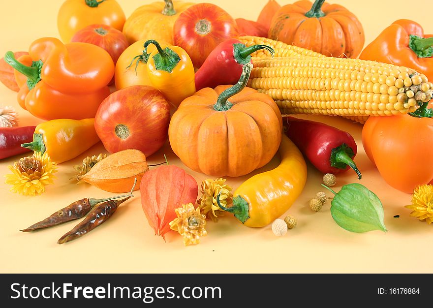 Fresh healthy vegetables on yellow background. Fresh healthy vegetables on yellow background