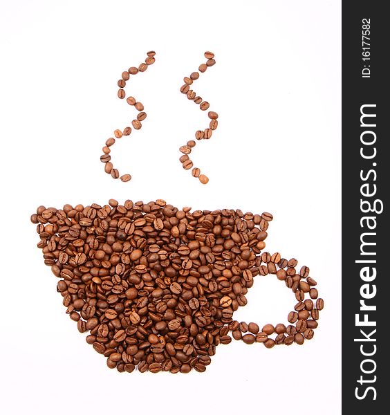 Cup of coffee shape made of coffee beans on white background