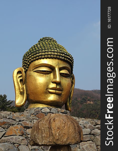 The head of giant buddha statue in the Wawoojongsa temple. The head of giant buddha statue in the Wawoojongsa temple