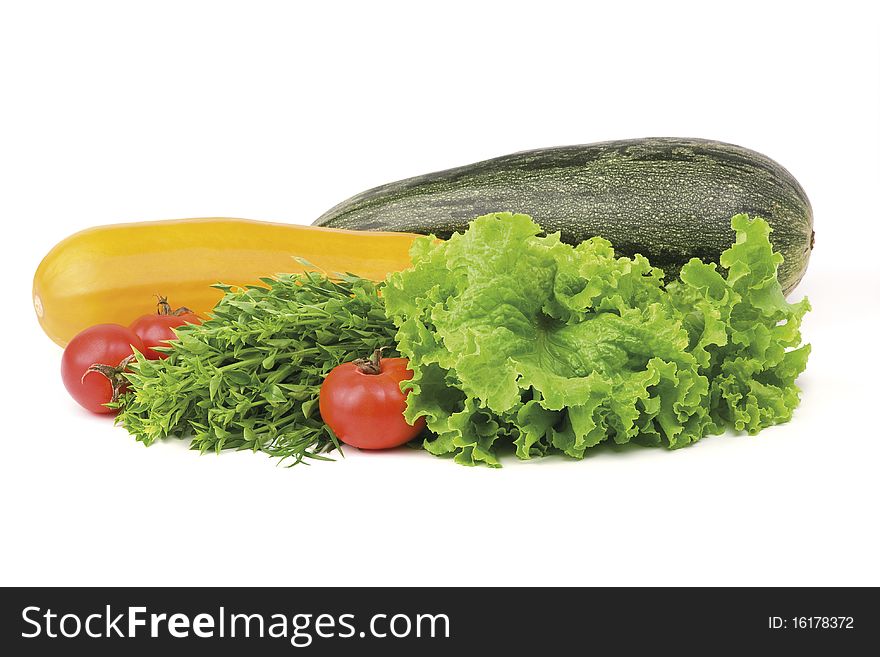 Fresh tasty vegetables isolated on white background. Lettuce, Tomato, Basil, Squash and Zucchini. Fresh tasty vegetables isolated on white background. Lettuce, Tomato, Basil, Squash and Zucchini.