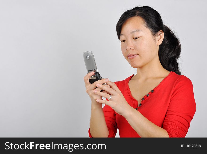 An Asian girl on the phoneï¼Œwhich taken in China