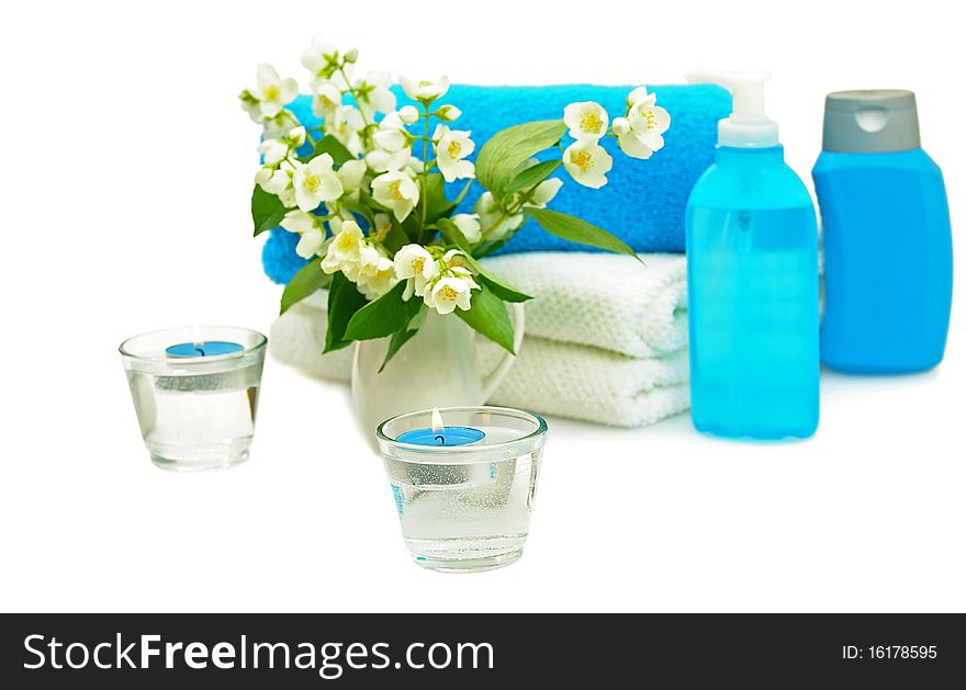 Blue spa with jasmin on white background