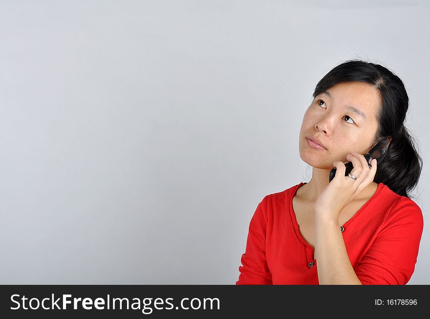 An Asian girl on the phone，which taken in China