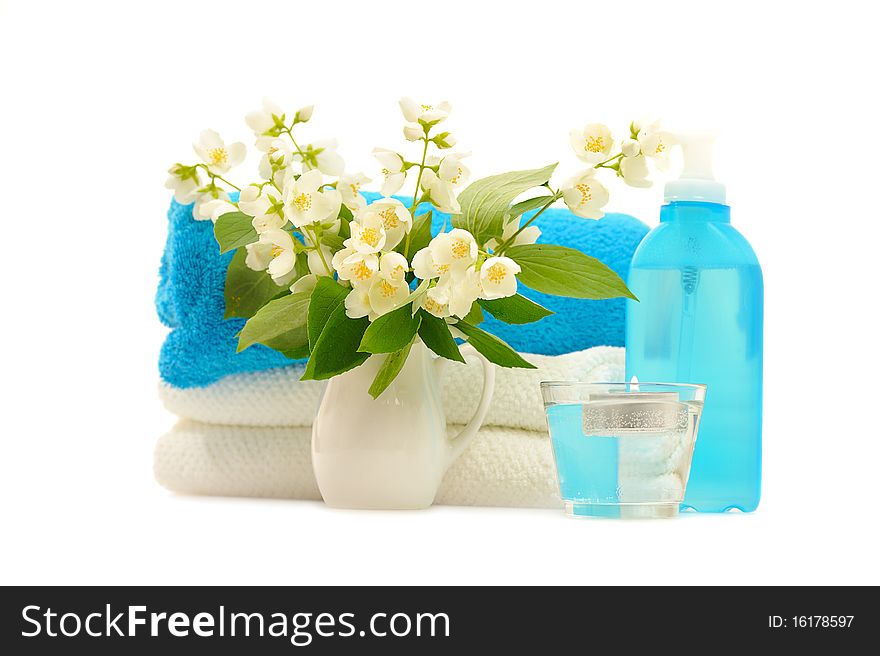 Blue spa with jasmin on white background